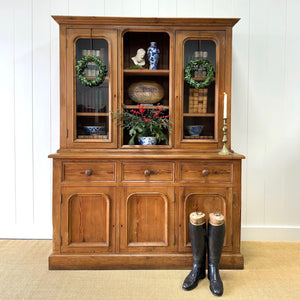 A 19th Century English Pine Bookcase Cabinet or Hutch with Arched Doors