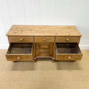 An English Country 7 Drawer Pine Buffet or Sideboard