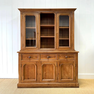 A 19th Century English Pine Bookcase Cabinet or Hutch with Arched Doors