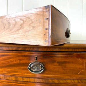 A Large Antique English Bow Front Mahogany Chest of Drawers