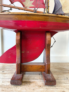 An English Antique Red Pond Yacht with Stand