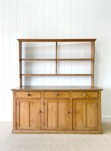 An Early 19th Century Monumental Pine Welsh Dresser or Cupboard