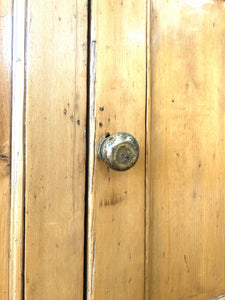 An English 19th Century Pine Bookcase with Glazed Doors