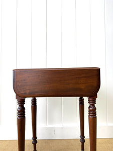 A Petite Early Victorian Mahogany Pembroke Table