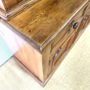A 19th Century English Pine Bookcase Cabinet or Hutch with Arched Doors