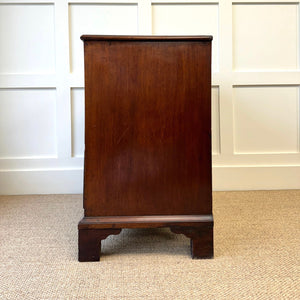 A English Georgian Chest of Drawers with Swan Neck Hardware