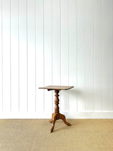 An Antique English Birch Tilt-top Table