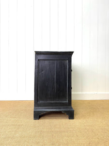 An Ebonized Antique English Chest of Drawers/Dresser