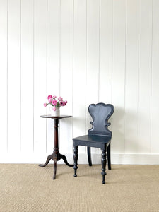 An Antique English Ebonized 19th Century Hall Chair