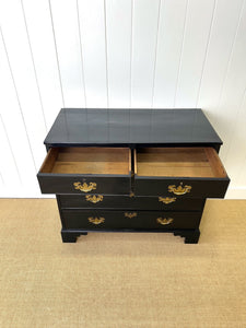 An Ebonized Antique English Chest of Drawers/Dresser