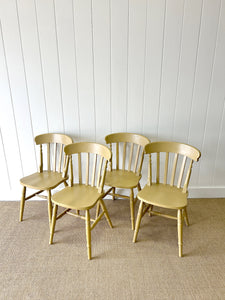 A Vintage Set of 4 Mustard Slat Back Chairs