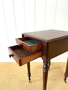A Petite Early Victorian Mahogany Pembroke Table