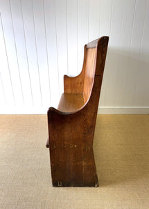An Antique English Pine Settle or Hall Bench
