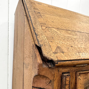 An Antique English Georgian Cumbrian Washed Oak Slant Front Desk