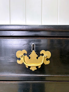 An Ebonized Antique English Chest of Drawers/Dresser