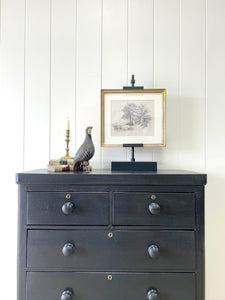 An Ebonized Antique English Chest of Drawers/Dresser