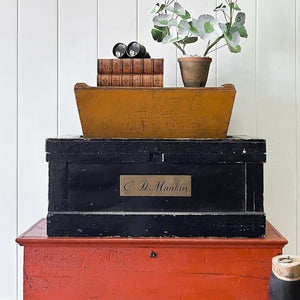 An Ebonized Campaign Sea Chest