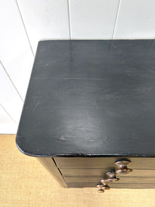 An Ebonized Antique English Chest of Drawers/Dresser
