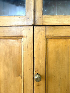 An English 19th Century Pine Bookcase with Glazed Doors