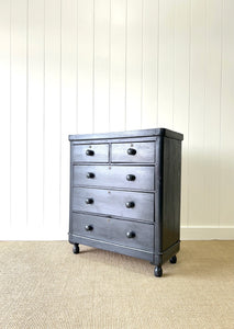 An Ebonized Antique English Chest of Drawers/Dresser