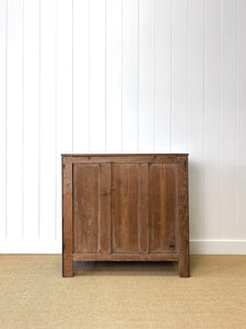 An Ebonized Antique English Chest of Drawers/Dresser