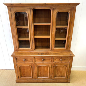 A 19th Century English Pine Bookcase Cabinet or Hutch with Arched Doors