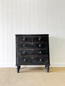 An Ebonized Antique English Chest of Drawers/Dresser