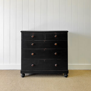 An Ebonized Antique English Chest of Drawers/Dresser