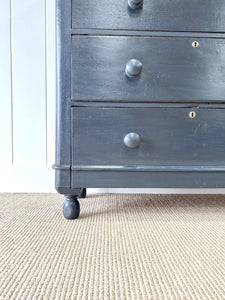 An Ebonized Antique English Chest of Drawers/Dresser