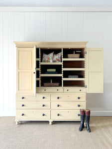 A Very Large and Useful English Pine Painted Housekeepers Cupboard