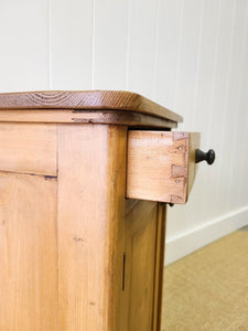 A Vintage Charming Pine Nightstand with Dark Knobs