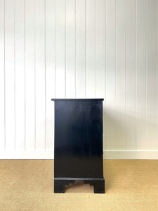 An Ebonized Antique English Chest of Drawers/Dresser