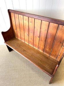 An Antique English Pine Settle or Hall Bench