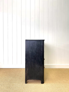 An Ebonized Antique English Chest of Drawers/Dresser