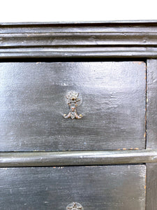 An Ebonized Antique English Chest of Drawers/Dresser