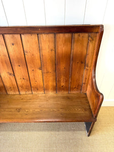 An Antique English Pine Settle or Hall Bench