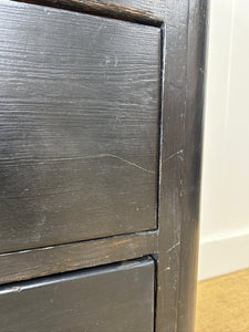 An Ebonized Antique English Chest of Drawers/Dresser