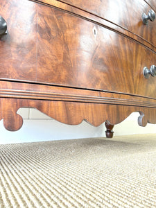 A Large Antique English Bow Front Mahogany Chest of Drawers