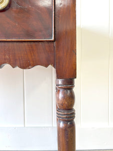 An Antique English Desk or Table with Three Drawers