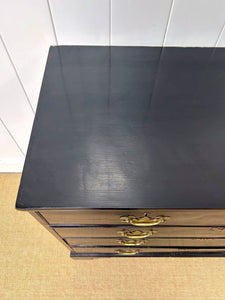 An Ebonized Antique English Chest of Drawers/Dresser