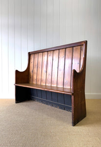 An Antique English Pine Settle or Hall Bench