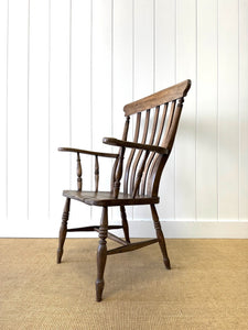 A Victorian Elm Slat Back English Windsor Farmhouse Armchair