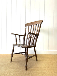 A Victorian Elm Slat Back English Windsor Farmhouse Armchair