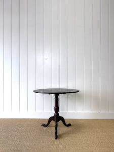 A George III Oak Circular Tilt-Top Tripod Tea Table
