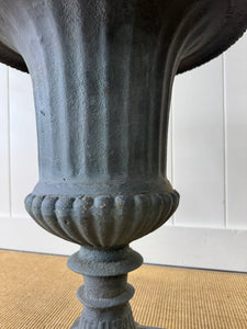 A Large and Special Pair of Antique Cast Iron Garden Urns