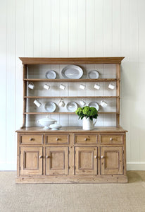 An Early 19th Century Monumental Pine Welsh Dresser or Cupboard
