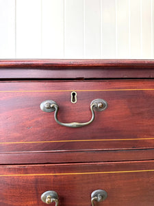 A English Georgian Mahogany Chest of Drawers with Swan Neck Hardware