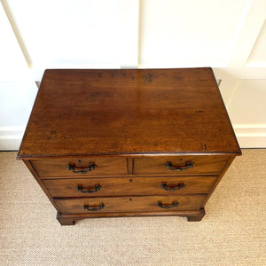 A English Georgian Chest of Drawers with Swan Neck Hardware