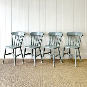 A Vintage Set of 4 Slat Back Chairs