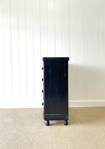 An Ebonized Antique English Chest of Drawers/Dresser